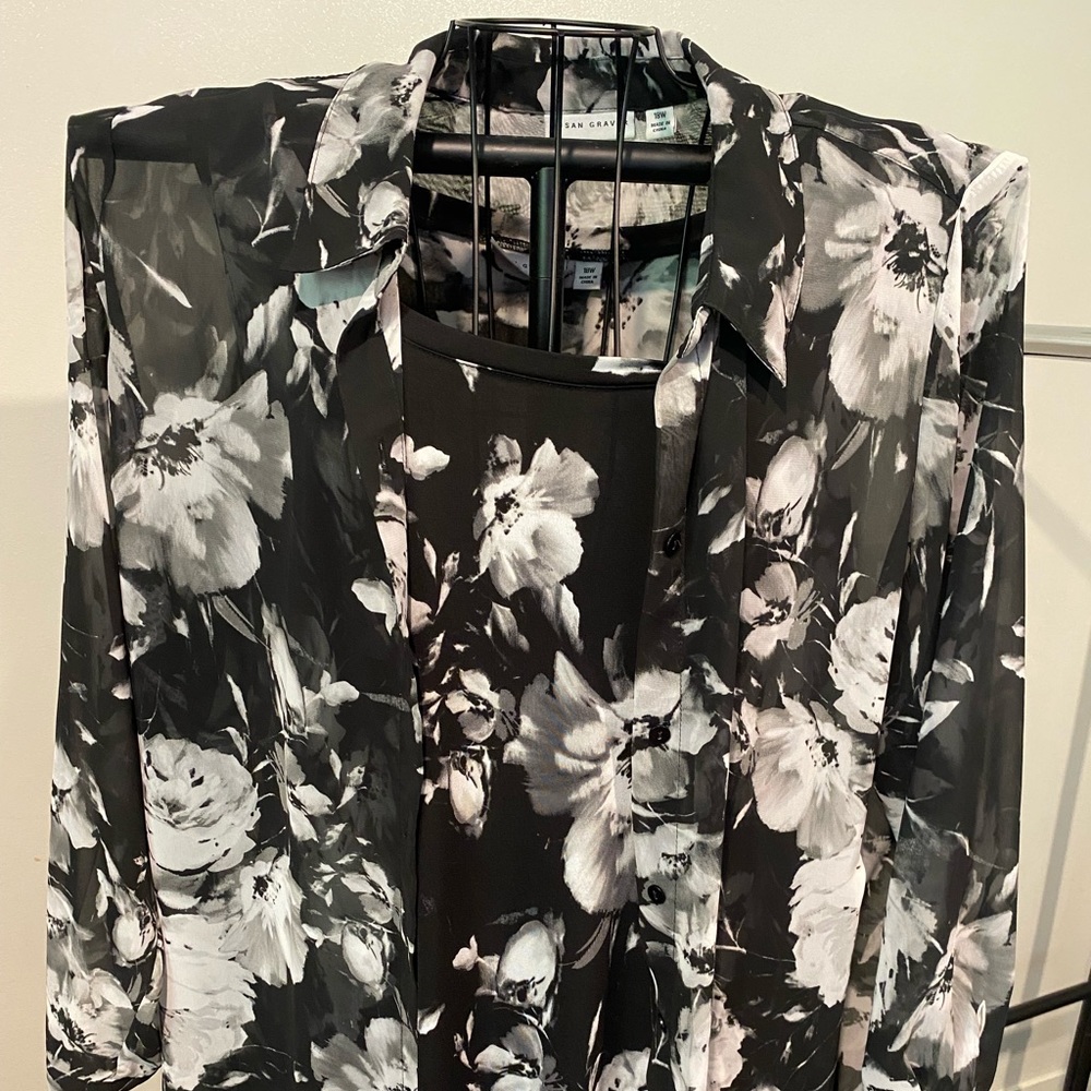 Sleeveless top with sheer over blouse.